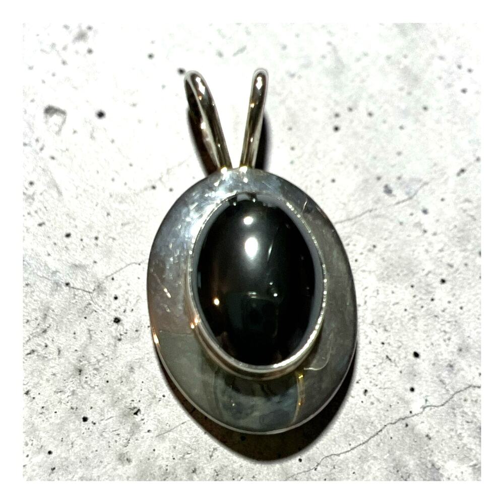 Vintage Modernist Sterling Silver Pendant Featuring a Polished, Metalic Hematite